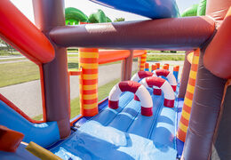 Buy shark-themed inflatable obstacle course with 7 game elements and colorful objects for children. Order inflatable obstacle courses now online at JB Inflatables UK