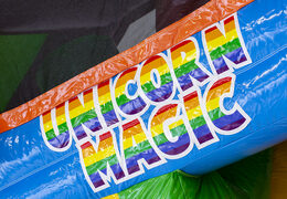 Unicorn themed bouncer with slide, pillars on the jumping surface and striking 3D objects for children. Buy inflatable bouncers online at JB Inflatables UK