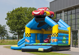 Buy a multifun bouncy castle in a car theme with a striking 3D figure on the roof for kids. Order bouncy castles online at JB Inflatables UK