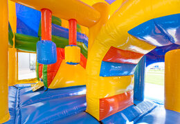 Medium inflatable clown themed bouncer with slide and pillars on the jumping surface, buy for children. Order inflatable bouncers online at JB Inflatables UK