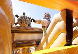 Spectacular inflatable slide in a striking pirate ship shape with cool 3D objects and full color prints for children. Buy inflatable slides now online at JB Inflatables UK