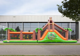 Order a 17 meter wide unique jungle themed obstacle course with 7 game elements and colorful objects for children. Buy inflatable obstacle courses online now at JB Inflatables UK