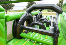 Buy inflatable obstacle course 17 meters wide, tractor themed with 7 game elements and colorful objects for children. Order inflatable obstacle courses now online at JB Inflatables UK