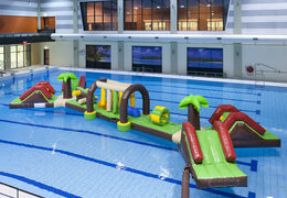 Buy an inflatable 16 meter long Double Hawaii Run XL obstacle course with various exciting objects for both young and old. Order inflatable water attractions now online at JB Inflatables America