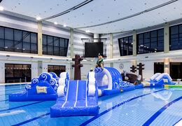 Order a pirate run themed double pool assault course for both young and old. Buy inflatable water attractions online now at JB Inflatables America