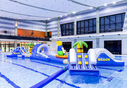 Get an airtight double inflatable 16 meter long surfer run swimming pool assault course in a unique design with funny 3D objects and no less than 2 slides for both young and old. Order inflatable obstacle courses online now at JB Inflatables America