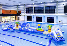 Buy a unique double surfer run inflatable obstacle course for both young and old. Order inflatable pool games now online at JB Inflatables America