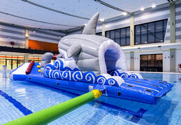Get an inflatable shark-themed slide for both young and old. Order inflatable pool games now online at JB Inflatables America