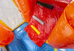 Multiplay party bounce house with a slide, fun objects on the jumping surface and eye-catching 3D objects to buy for children. Order inflatable bounce houses online at JB Inflatables UK