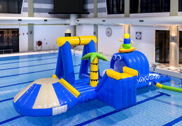 Unique airtight inflatable surfer play island with a vine, climbing tower, round slide and obstacles for both young and old. Buy inflatable pool games now online at JB Inflatables America