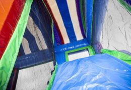 Buy a small inflatable bouncer in a unicorn theme with slide for children. Order inflatable bouncers online at JB Inflatables UK