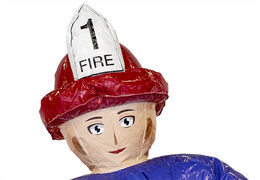 Order a fire brigade bouncy castle in a unique design with two entrances, a slide in the middle and 3D objects for kids. Buy bouncy castles online at JB Inflatables UK