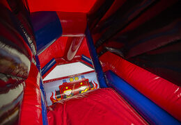 Inflatable slide combo firefighter-themed bouncers for sale at JB Inflatables UK. Inflatable bouncers with slide for kids available to buy in red and blue colors
