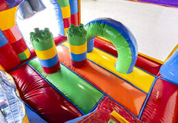 Buy indoor inflatable multiplay bouncer with slide in Lego theme for kids. Order inflatable bouncers online at JB Inflatables UK