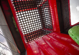 Order an inflatable 40 meter long red black mega alligator obstacle course. Buy inflatable obstacle courses online now at JB Promotions UK