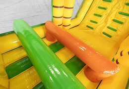 Obstacle course 13.5 meters long in a jungle theme with appropriate 3D objects for children. Order inflatable obstacle courses now online at JB Inflatables UK