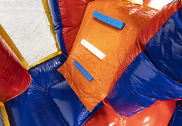 Medium inflatable multiplay bouncer in formula 1 theme with slide for children. Order inflatable bouncers online at JB Inflatables UK