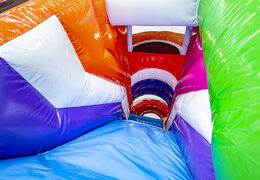 Medium inflatable bouncer in flamingo theme with slide for children. Order inflatable bouncers online at JB Inflatables UK