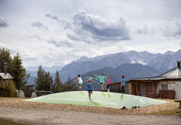 Custom St. Vigil themed kids airmountain for sale. Order custom airmountains at JB Inflatables UK