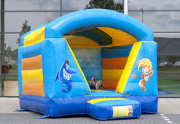 Small bounce house with roof for kids to buy in blue and yellow seaworld theme. Buy bounce houses online at JB Inflatables UK 