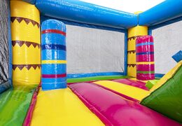 Buy mini inflatable flamingo-themed bouncy castle with slide for children. Order inflatable bouncy castles with slide online at JB Inflatables UK