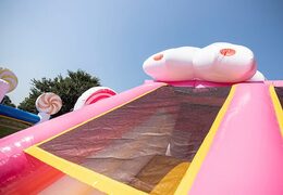 Candyworld bouncer with slides, obstacles with fun candy-themed prints for kids. Buy bouncers online at JB Inflatables UK