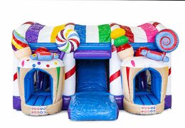 Multiplay XXL Candyland bouncy castle in a unique design with two entrances, a slide in the middle and 3D objects for kids. Buy bouncy castles online at JB Inflatables UK