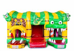 Multiplay XXL Jungleworld bouncy castle in a unique design with two entrances, a slide in the middle and 3D objects for kids. Buy bouncy castles online at JB Inflatables UK