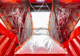 Inflatable multiplay fire brigade bouncer with a slide in the middle and 3D objects for children. Order bouncers online at JB Inflatables UK