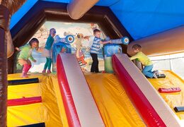 Buy shooting combo pirate bouncy castle with shooting game and slide for kids. Order bouncy castles online at JB Inflatables UK