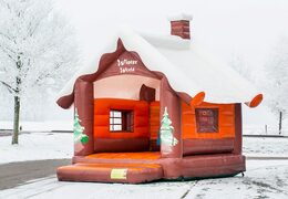 Skihut winterworld bouncer with a 3D chimney at the top for children. Buy bouncers online at JB Inflatables UK