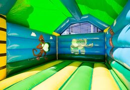 Buy a standard jungle bounce houses in striking colors with a large 3D gorilla object on the top for children . Buy bounce houses online at JB Inflatables UK