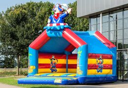 Super bouncy castle with roof in pirate theme for kids. Buy bouncy castles online at JB Inflatables UK
