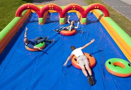 Life size shuffleboard on bouncy castle game