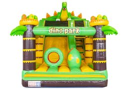 Bouncy castle with obstacles and slide in Dino Park theme