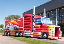 Inflatable bouncer with truck theme in red color