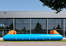 Buy blue orange inflatable table football with unique boarding slide system for kids. Order inflatable table football now online at JB Inflatables Netherlands