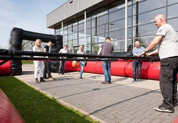 Buy black red table football game with unique boarding sliding system without bottom for children.