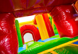 Inside of inflatable castle Dubbelslide Multiplay Green red yellow