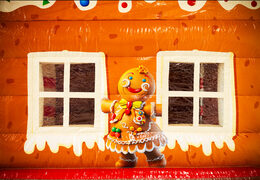 Illustration of a gingerbread figure and windows on Multifun JB bouncy castle