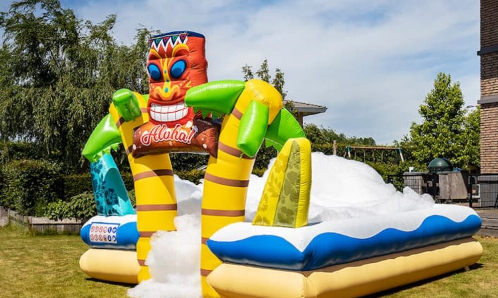Order large inflatable open bubble boarding park bouncy castle with foam in the theme tropical hawaii for children. Buy inflatable bouncy castles online at JB Inflatables UK