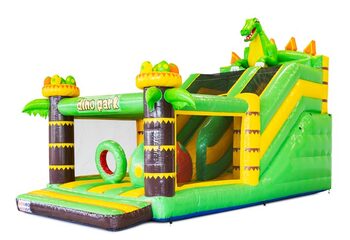Buy a large bouncy castle with slide and obstacles at JB Inflatables