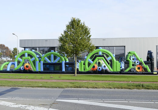 Buy a 30 meter mega obstacle course in the colors black and green for both young and old. Order inflatable obstacle courses now online at JB Inflatables UK