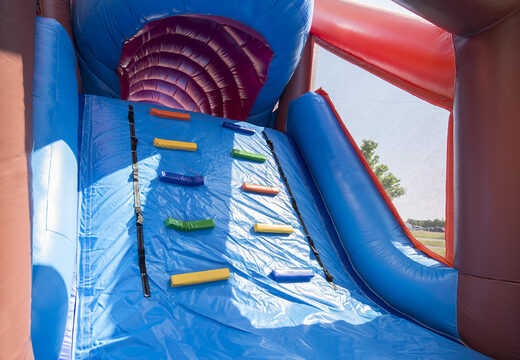 Order an inflatable shark-themed obstacle course with 7 game elements and colorful objects for kids. Buy inflatable obstacle courses online now at JB Inflatables UK