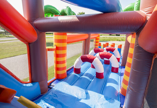 Buy shark-themed inflatable obstacle course with 7 game elements and colorful objects for children. Order inflatable obstacle courses now online at JB Inflatables UK