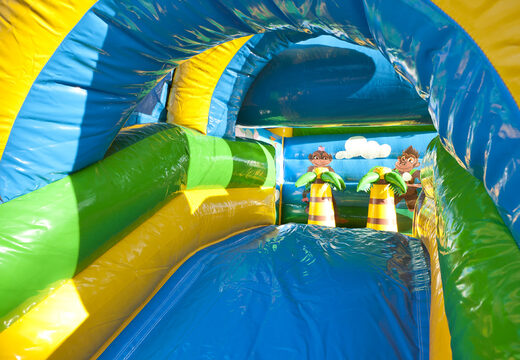 Buy indoor multifun bounce house with slide in jungle theme with a large 3D object of a gorilla on top for children. Order inflatable bounce houses online at JB Inflatables UK