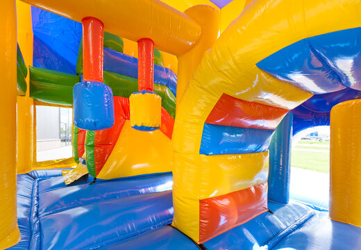 Medium inflatable clown themed bouncer with slide and pillars on the jumping surface, buy for children. Order inflatable bouncers online at JB Inflatables UK