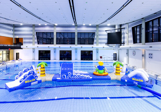 Inflatable double obstacle course 16 meter long surfer run swimming pool assault course in a unique design with funny 3D objects and no less than 2 slides for both young and old. Order inflatable pool obstacle courses now online at JB Inflatables America