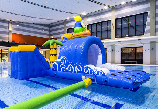 Order an inflatable airtight surfer play island with a vine, climbing tower, round slide and obstacles for both young and old. Buy inflatable water attractions online now at JB Inflatables America