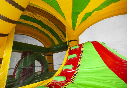 Jungle themed bouncer with a slide for children. Buy inflatable bouncers online at JB Inflatables UK